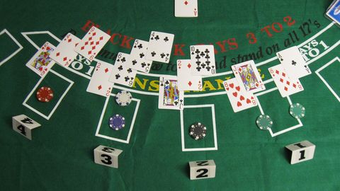 Cards dealt on a blackjack layout