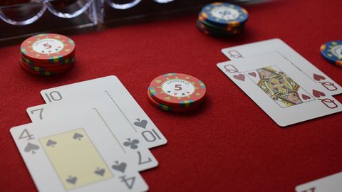 Cards and chips on a live table