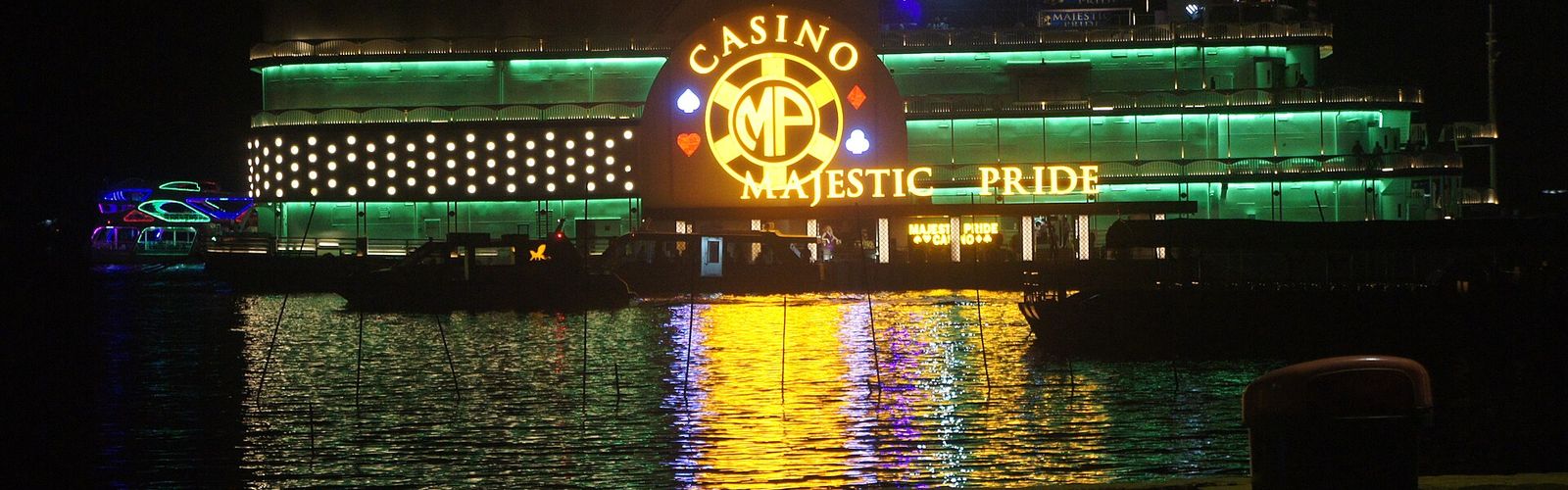 Casino ships lit up on the Mandovi river in Goa